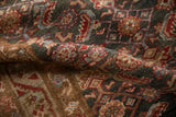 Distressed pile of a vintage Hamadan rug, showcasing Herati motifs in time-softened charcoal, red, and blue.