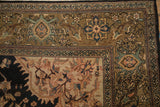 Antique Malayer carpet corner with olive green field, polychrome floral vines, and Samovar border.