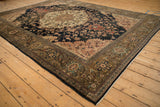 Antique Malayer carpet corner shows olive green main border with turtle Samovar motifs and white fringe.