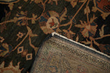 Antique Malayer carpet pile in navy and brick red blossoms, revealing its fine hand-knotted foundation.