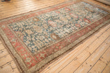 Full-length view of the antique distressed Bijar runner, showing its intricate Harshang design pattern.