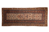 Antique Serab runner with a lattice design, diamond medallion, and camel border with repeating botehs.