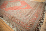 Distressed antique Halvai Bijar with Herati spandrel, samovar turtle, and dragon border.
