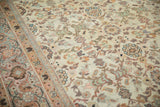 Antique Persian Mahal carpet: cream field with Veramin blossoms and a meandering vine border.
