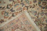 Finely woven antique Mahal carpet displaying blossom and vine motifs, fringe, and border.