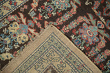Hand-knotted foundation and colorful pile visible on the folded corner of a vintage Persian runner.