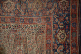 Antique Senneh rug corner, ivory field of paisley botehs, terra cotta Herati border.