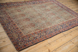 Antique Senneh rug main border with samovar and Herati blossom motif, dusty terracotta, indigo blue, wear.