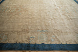 Low angle view across the antique Art Deco carpet's expansive field, highlighting the soft pile texture.