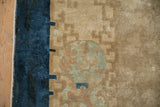 The low pile and intact side cord of an antique Art Deco carpet's cobalt blue border.