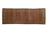 Distressed vintage Hamadan runner with an allover boteh lattice showing strong horizontal abrash in earthy copper and charcoal.