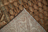 Hand-knotted foundation and low, distressed pile of a vintage Persian Hamadan runner.