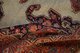 Antique Fereghan rug, folded pile texture, with tomato red and navy blue curvilinear motifs.