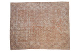 Antique distressed Sultanabad carpet with willow tree and vinery designs in dusty copper, ivory, and faded slate blue.