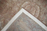 Reverse corner of an antique Sultanabad carpet showing the hand-knotted weave and sewn fabric backing.