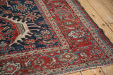 Fine hand-knotted texture of an antique Karaja rug corner in cobalt blue, cherry red, and ivory.