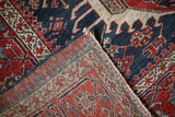 Corner view of a fine Karaja rug showing the hand-knotted back and rich, colorful pile.
