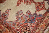 Close-up on the mostly even wear and serrated spandrel of an antique Persian rug.