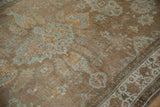 Antique Persian Mahal carpet with worn powder blue palmette and floral field designs.