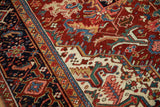 Intricate hand-knotted details of the Turtle Samovar border on a vintage Persian Heriz rug.