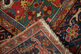 Turtle Samovar border design and intact side cord on a vintage Heriz carpet corner.