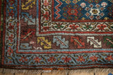 Close-up of the antique runner's serrated leaf and meandering vine borders.
