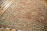 Angled view showcasing the soft wool and gentle color abrashes on a vintage Mahal carpet.