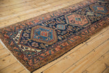 Hand knotted Heriz runner field: cobalt blue stepped medallions, dusty rose blossoms.