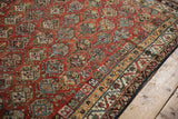 Antique Qashqai rug border, meandering vine and germinating shrub motifs, chestnut, blue, ivory.