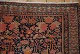 Persian Malayer rug corner, dusty blush floral patterns, germinating blossom border.