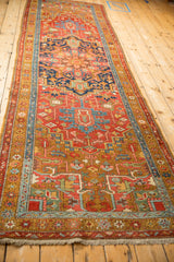 A long perspective view showing the grand scale of this antique Heriz runner.