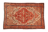 Antique Persian Malayer rug, ruby red shield medallion, blossoming vines, beige field, sapphire borders.