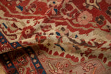 Antique Malayer rug detail: fine weave, ruby red, beige, and sapphire blue blossoms.