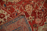 Folded corner of antique Malayer rug, revealing its hand-knotted foundation and sapphire blue border.