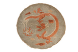 Antique Art Deco round rug with a pictorial five-toed dragon in terracotta on a silver sandalwood field.