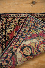Hand-knotted foundation and secure side cord detail of an antique Persian Yezd rug corner.