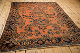 Antique Persian Lilihan rug corner, sapphire blue border with unique shrimp-like fish, dusty rose field.