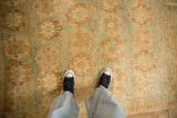 Low-pile texture and time-softened colors of a distressed vintage Afshar rug.