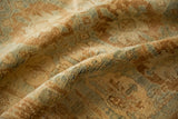 A soft fold in the vintage Afshar rug showing its short pile and distressed texture.
