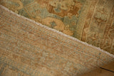 Close-up of the hand-knotted foundation and side cord on a distressed Afshar rug.
