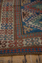 Antique hand-knotted Kazak rug borders with reciprocating pawn motif in sapphire blue and madder red.