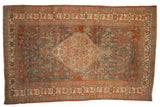 Antique Distressed Bijar rug with a hexagonal medallion, dusty teal and burgundy abrashed ground.