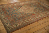 Antique Distressed Bijar rug corner detail, showing mostly even wear and teal border.