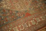 Antique Distressed Bijar rug's worn pile texture, abrash, and geometric borders in dusty teal and burgundy.