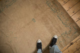 Antique Chinese Peking rug, beige field, seafoam green scrolling floral border.