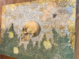 Textured green foliage, yellow flowers, and gold leaf in the 