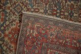 Detailed palmette border and short fringe on the folded corner of an antique Farahan Sarouk.