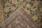 The reverse side of a vintage Hamadan rug, showing its hand-knotted construction.
