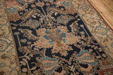 Fine detailing of dragon stylized leaves and checkered motifs on an antique Malayer rug.