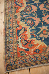Antique Senneh rug border featuring indigo, rust, blush gul farang motifs and triple column selvage.